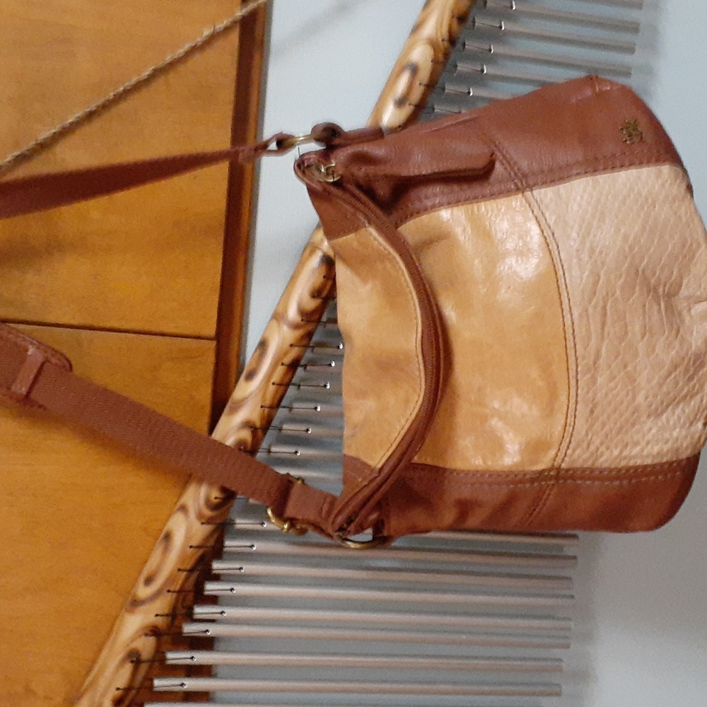 The Sak Brown and Tan Crossbody Bag  lots of room! like new!